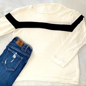 White, long sleeve layering sweater.
